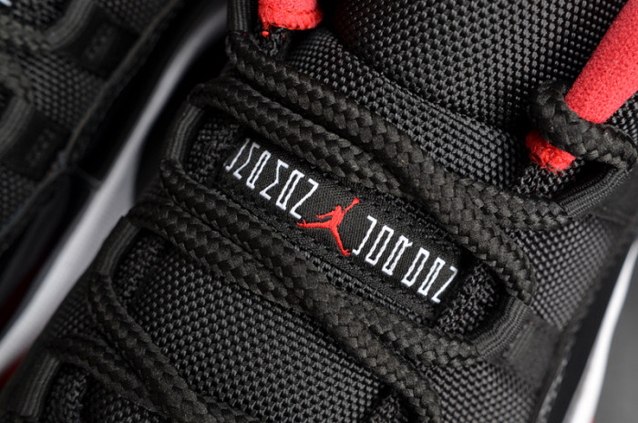 air jordan 11 retro low "bred" black/ red mens 528895-012