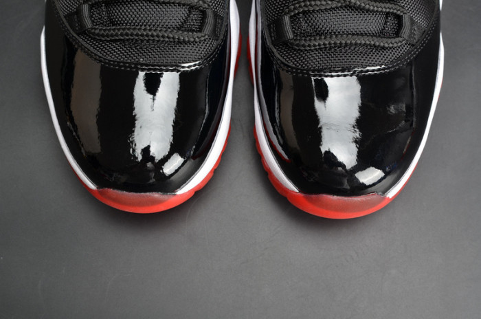 air jordan 11 retro low "bred" black/ red mens 528895-012