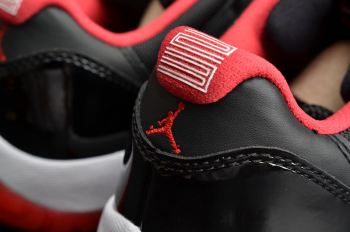 air jordan 11 retro low "bred" black/ red mens 528895-012